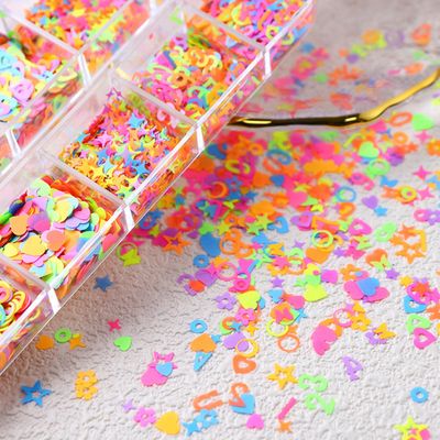 12 Grids Colorful Heart Nail Art Glitter Sequins 3D Holographic Mixed Pack Butterfly Star Letter Designs Glitter Flakes Acrylic Nail Supplies for Women Manicure Decorations Accessories Set
