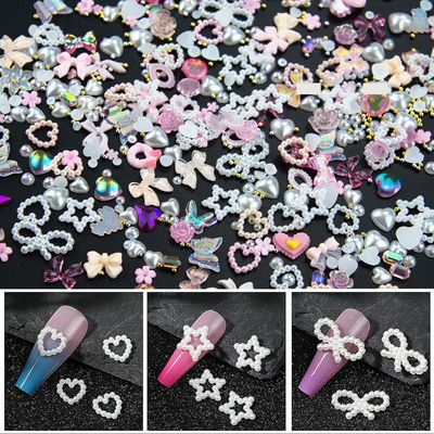 500Pcs Assorted Pearls 3D Nail Charms Pink Color Multi Shapes Heart Flower Bowknot Nail Charms Mix Heart Star Bows Round White Pearls Nail Beads Charms for Manicure DIY Crafts Jewelry Accessories