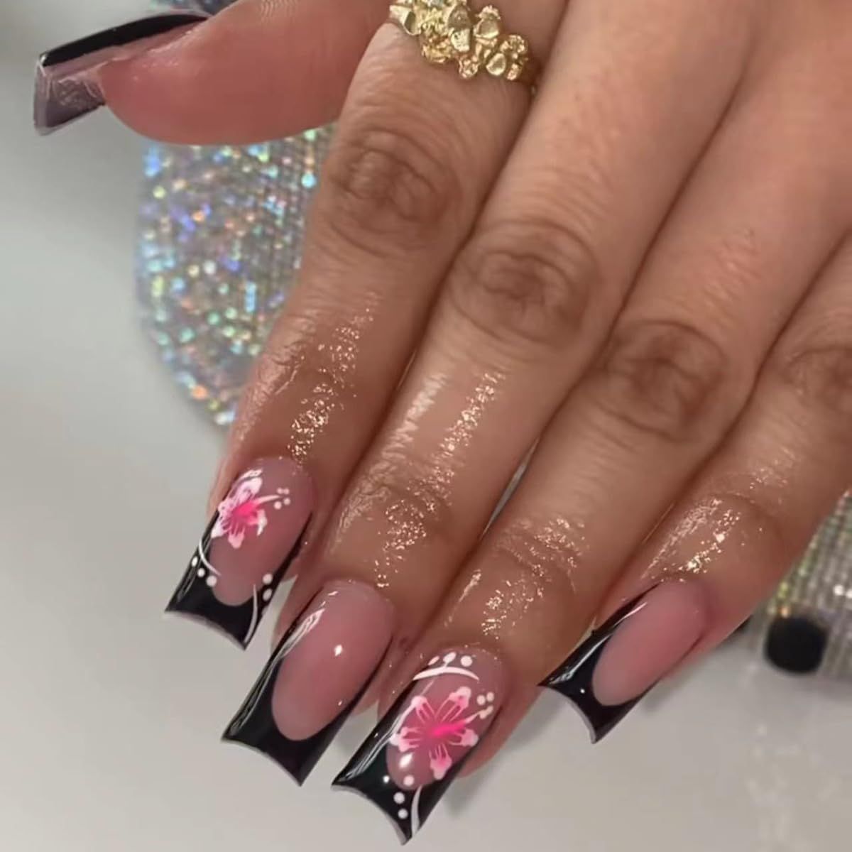 24Pcs Hibiscus Flowers Press on Nails Medium Square Shaped Fake Nails with Black French Tip Design False Nails Full Cover Nude Pink Sticks on Nails Glossy Glue on Nails for Women Manicure Nail Decor