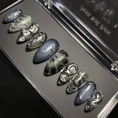 24Pcs Dark Press on Nails Medium Almond Fake Nails with 3D Y2k Irregular Silver Design Pearl Jewelry False Nails Glitter Full Cover Artificial Glue on Nails Gothic Stick on Nails for Women DIY Tips