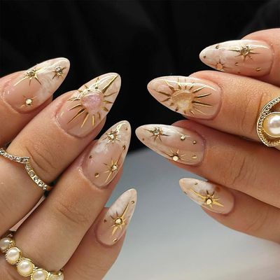 IMSOHOT Press on Nails Medium Almond Fake Nails Gold Sun, Moon, Heart Pattern Glue on Nails Full Cover Glossy Artificial Stick on False Nails Cute Nude Nails for Women Girls 24Pcs