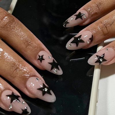 Black Star Press on Nails Medium Almond Fake Nails with Design Rhinestone Stick on Nails Acrylic Nails Star False Nails Glossy Natural Nude Glue on Nails for Women Girls Manicure 24Pcs