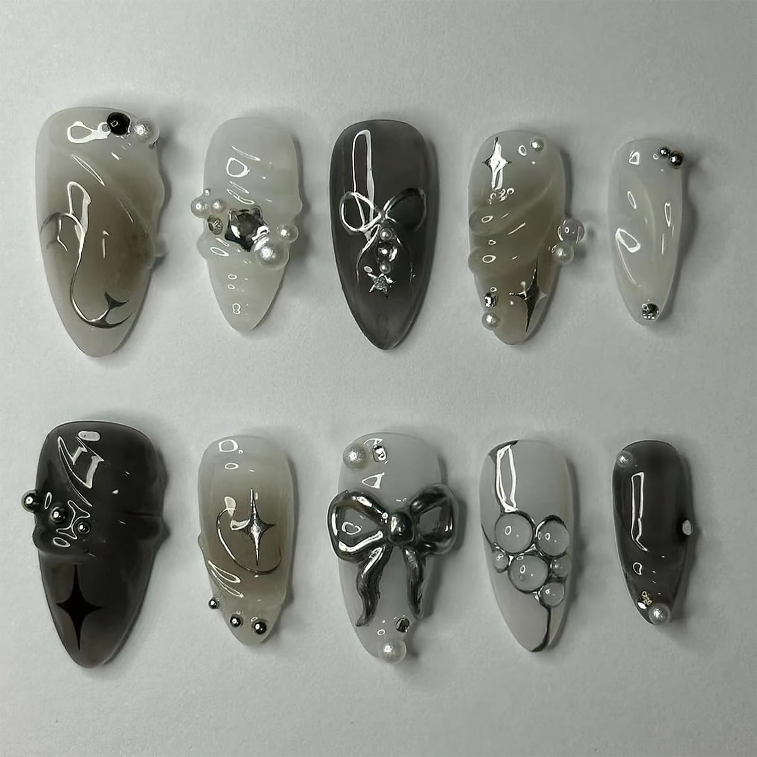 ROFIBUT Black Press on Nails Medium Almond Fake Nails with 3D Bow Pearl Designs Glossy Black Gradient False Nails Y2K Silver Star Water Drops Full Cover Acrylic Nails Stick on Nails for Women 24Pcs