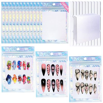 100PCS Holographic Nail Storage Bag Press on Nail Packaging Bags and 100PCS Shiny White Pearl Card Nail Tips Packaging Bag with 210 pcs Pre-cut Nail Tape Empty Nail Display Bag for Home Nail Salon Use