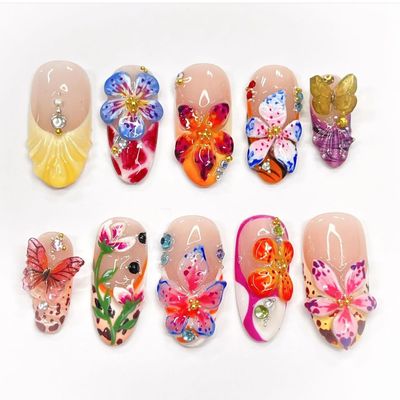 LBPEPAMZ 24Pcs Flower Press on Nails Medium Almond Fake Nails with 3D Colorful Spring Floral Butterfly Design Gold Beads Rhinestones Charms False Nails French Tips Glue on Nails for Women Daily Wear
