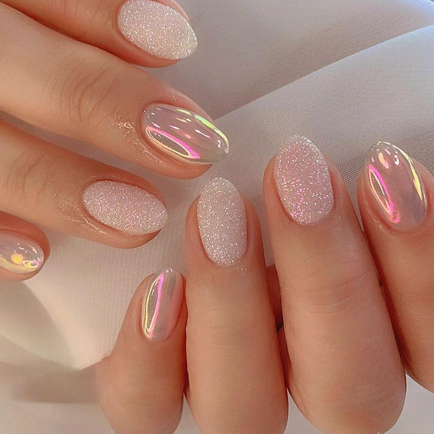 Bellelfin 24Pcs Short Oval Press on Nails Almond Fake Nails with Aurora Glitter Designs, Full Cover False Nail Nude Acrylic Nails Press Ons Reusable Glue on Press Nails for Women Fingernails Decor