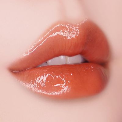 UNLEASHIA SISUA Popcorn Syrup Lip Plumper (No.2 Mango Caramel)