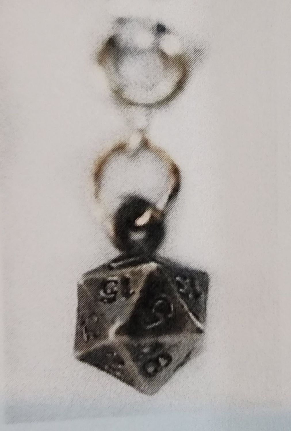 Travelers trinkets d20 charm