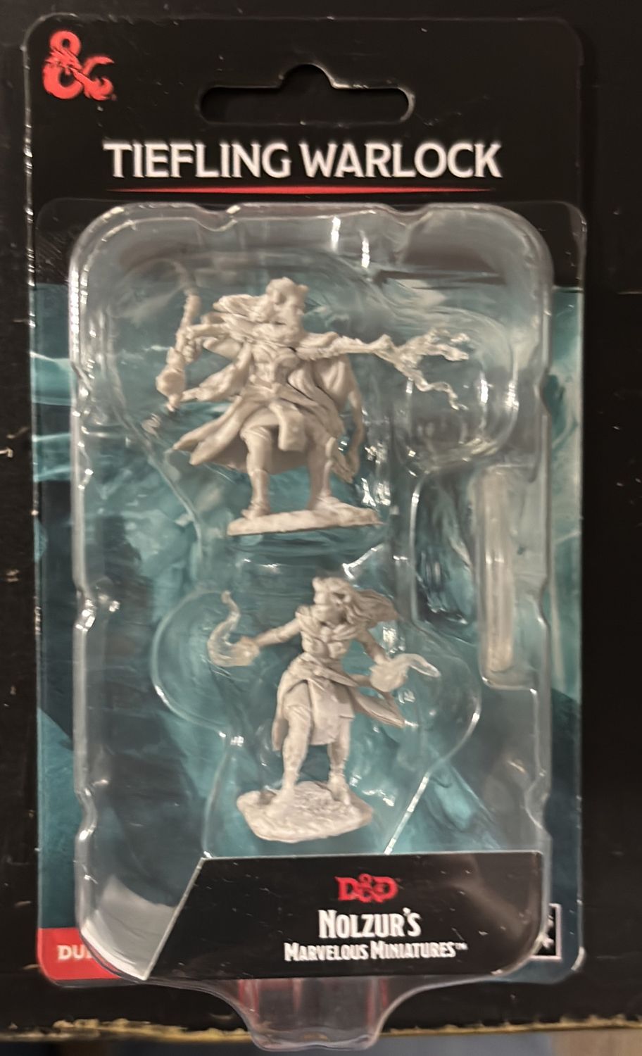 Nolzur’s Marvelous Miniatures: Female Tiefling Warlock