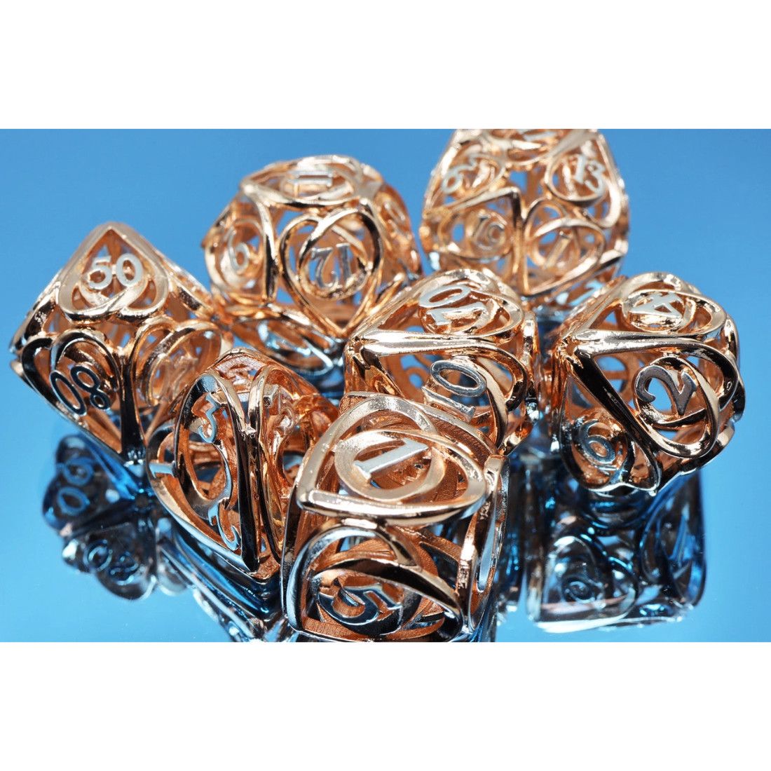 fb DICE SET 7 METAL HOLLOW HEARTS Copper