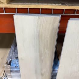 Syracuse waterproof rigid core luxury vinyl planks 20 mil /6.5mm thickness . 9x48 “ planks . 18 Sq.