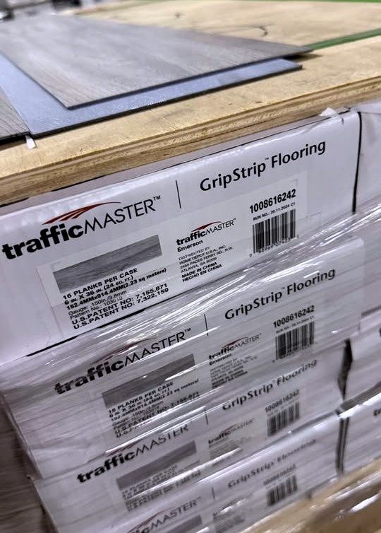 TrafficMaster Emerson 4 MIL x 6 in. W x 36 in. L Grip Strip Water Resistant Luxury Vinyl Plank Floor