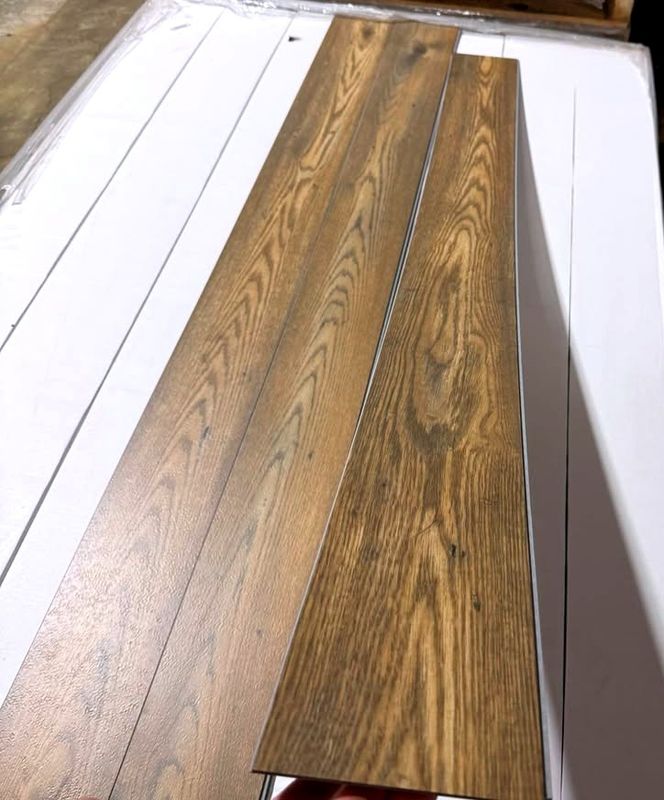 Rigid core 6mm /20 mil Pocatello waterproof vinyl flooring with padding attached
