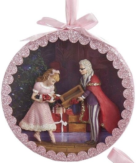 Drosselmeyer giving Clara the nutcracker ornament