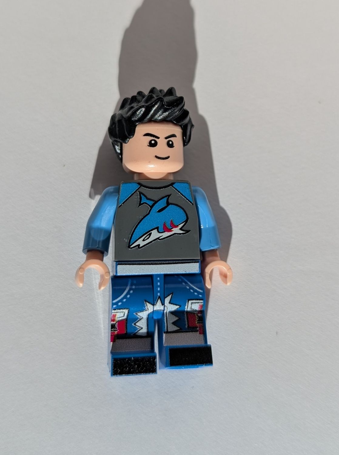 Minifigure Soap - Boy in Shark Shirt (Orange Scented) Minifigure Soap - Boy in Shark Shirt (Orange Scented)