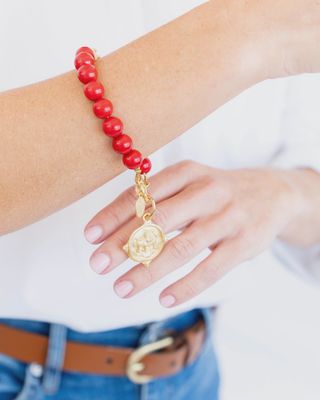 Gold Bulldog On Genuine Red Coral Bracelet