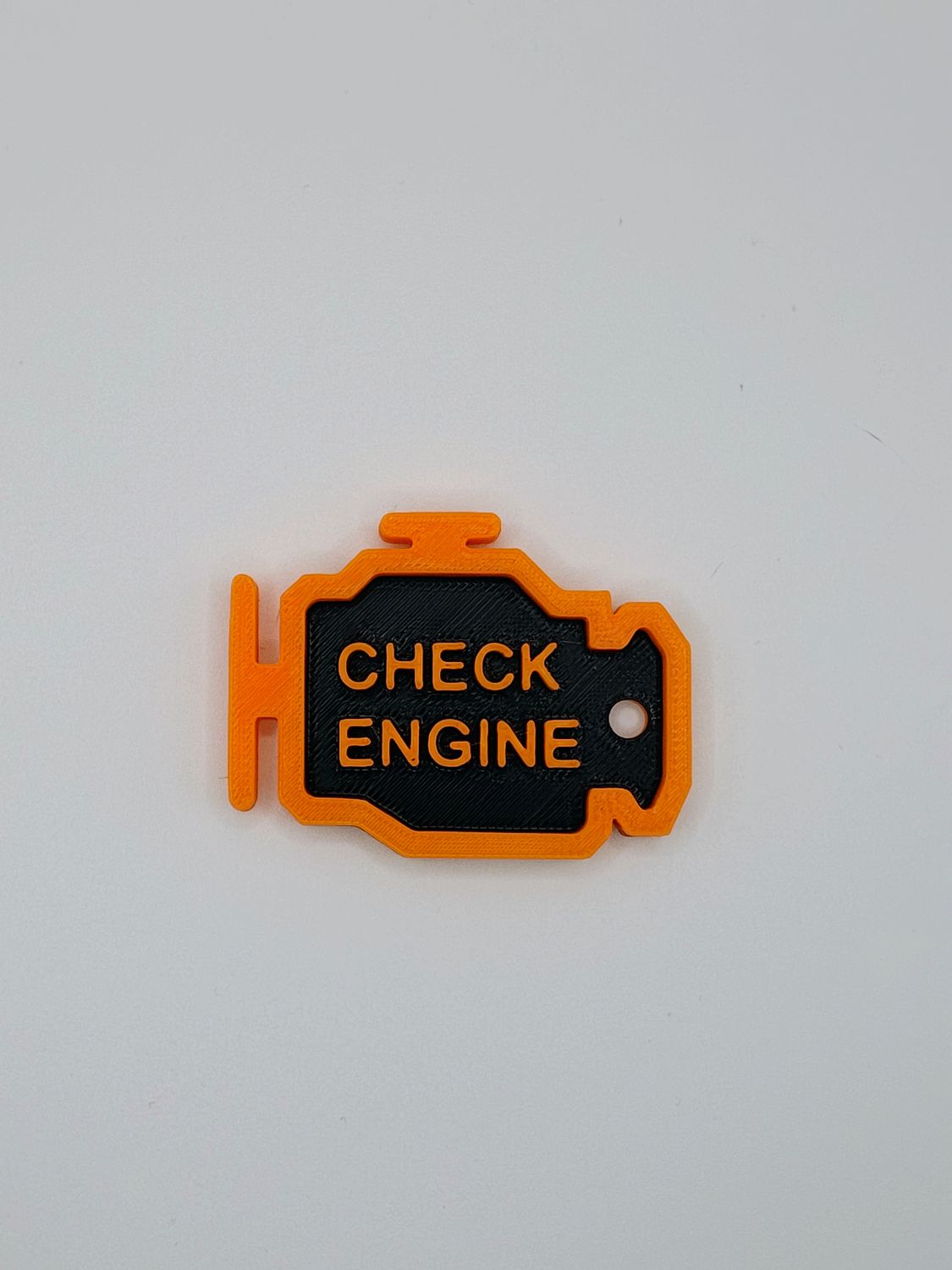 Brelok Check Engine