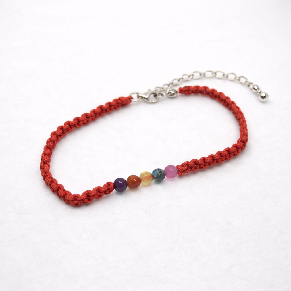 Pleciona srebrna bransoletka z agatami