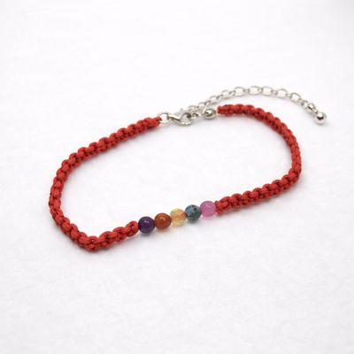 Pleciona srebrna bransoletka z agatami