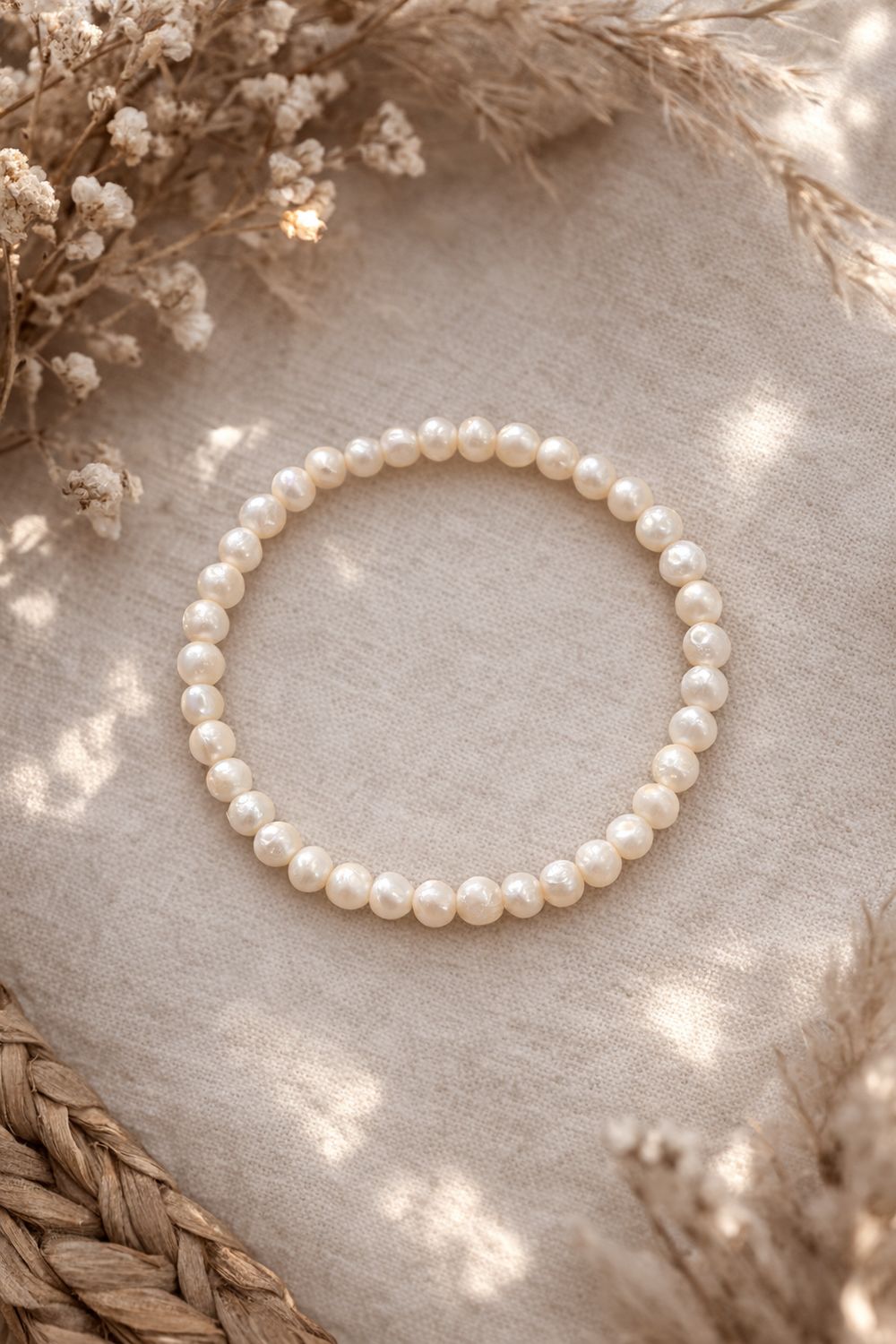 Bransoletka na gumce z perłami naturalnymi