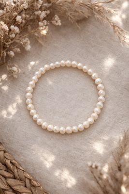 Bransoletka na gumce z perłami naturalnymi