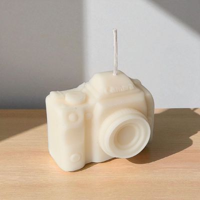 Świeczka sojowa aparat fotograficzny