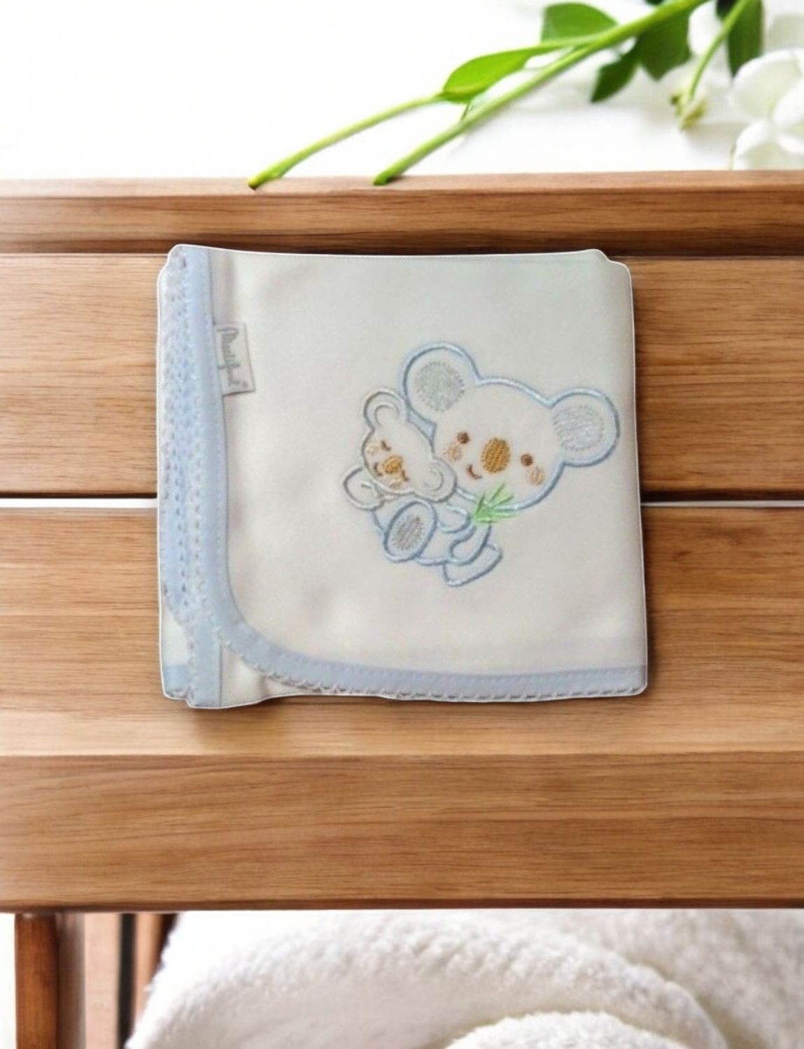 Cotton diaper with embroidered phrase