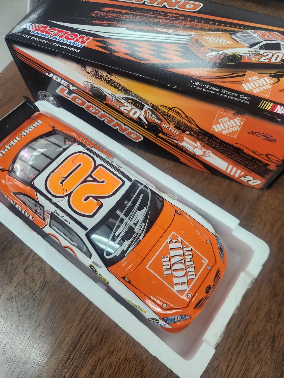 Joey Logano Autographed 2009 Home Depot Action 1:24 diecast car
