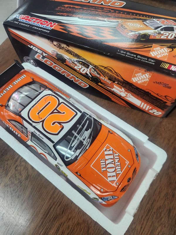 Joey Logano Autographed 2009 Home Depot Action 1:24 diecast car