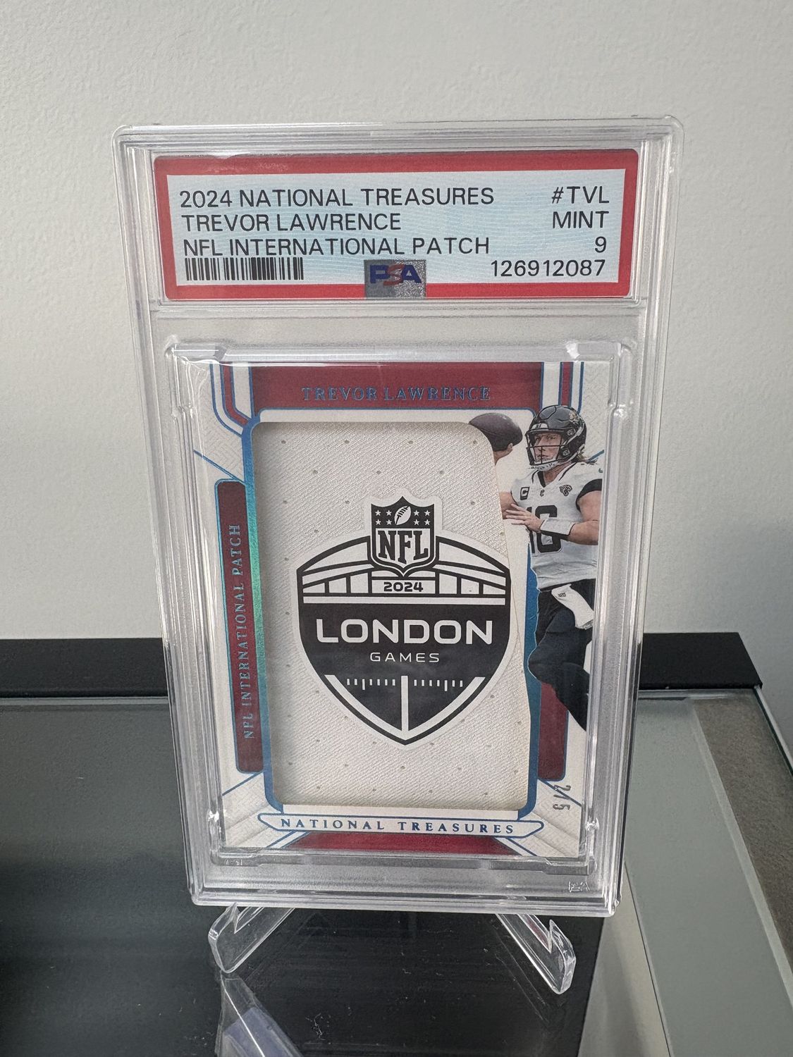 2024 National Treasures Trevor Lawrence NFL Patch PSA 9