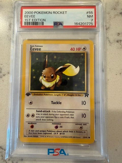 Pokemon Rocket Eevee 1st ed. PSA 7