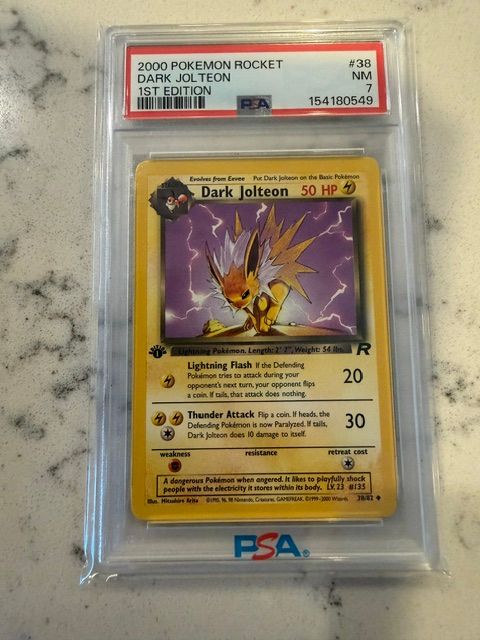 Pokemon Rocket Dark Jolteon 1st Ed. PSA 7