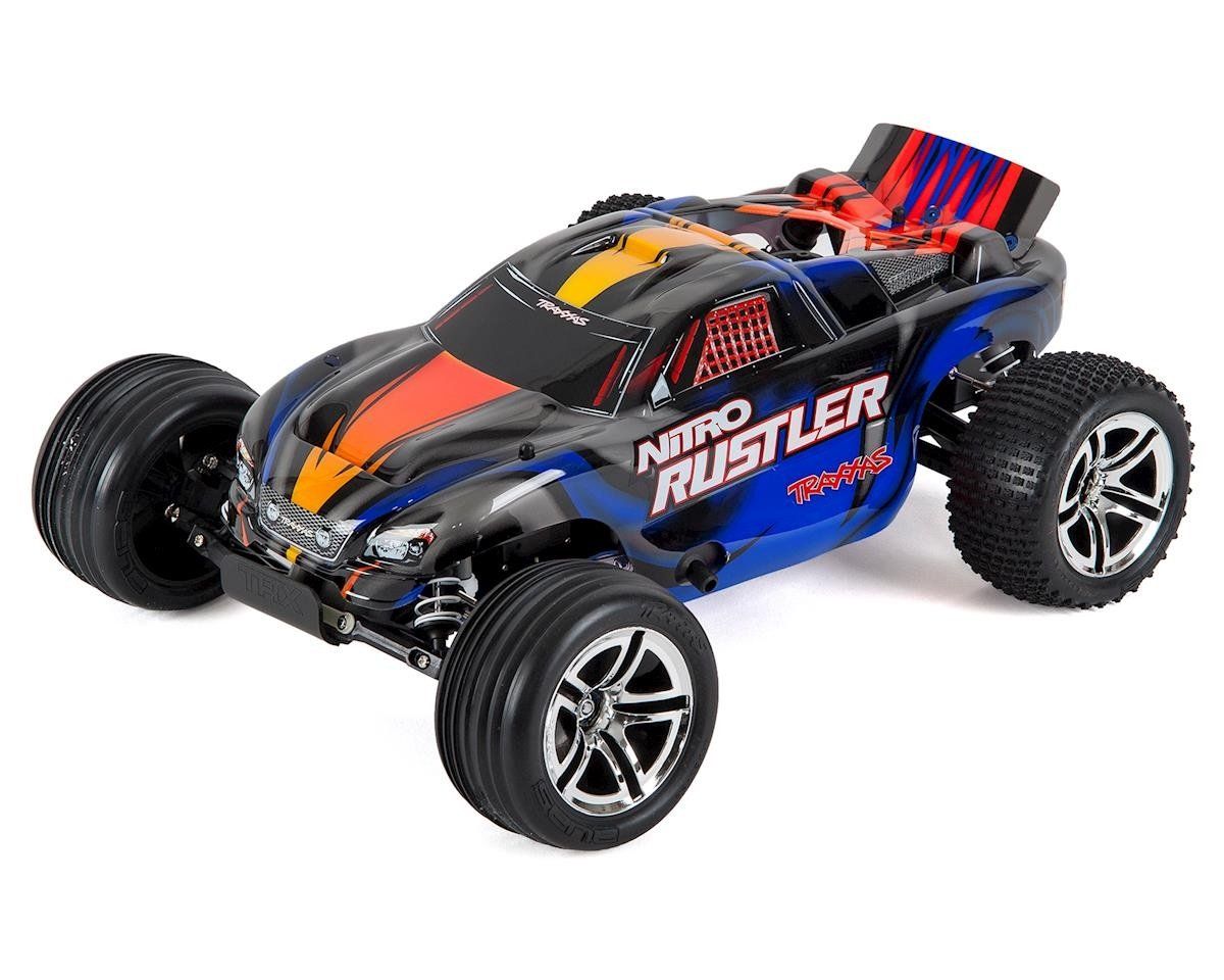 #44096-3-BLUE Traxxas Nitro Rustler 1/10 RTR Stadium Truck (Silver/Blue) w/TQi 2.4GHz, TSM, EZ Start, Battery &amp; DC Charger