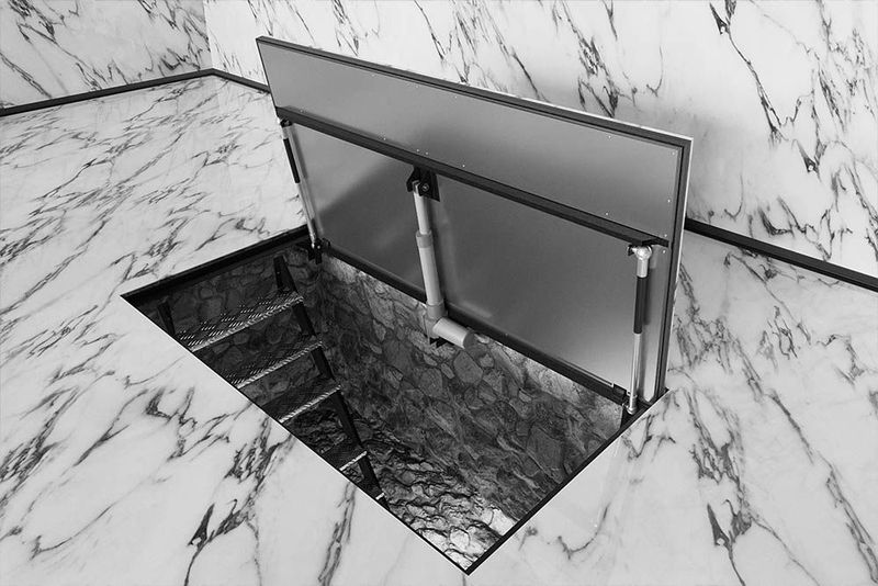 Interior floor hatches for tiles