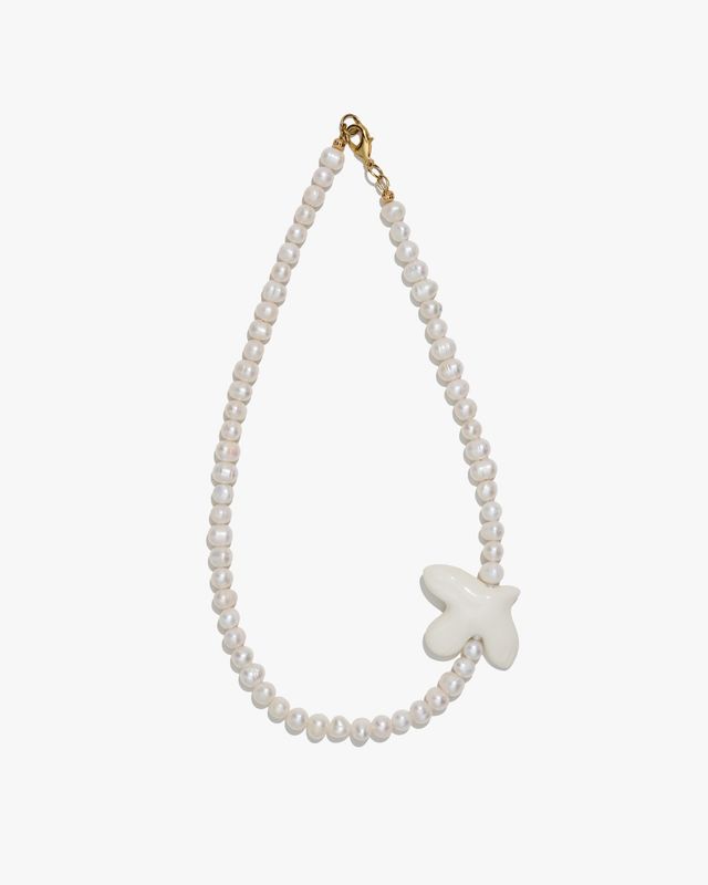 MYRNI necklace with medium pearls and bird on a soft base
