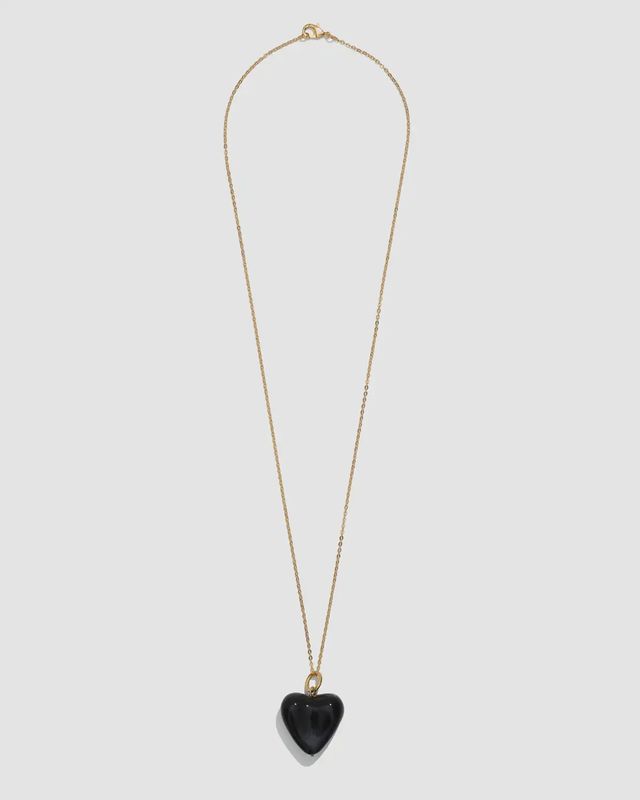 AURA pendant with a black heart