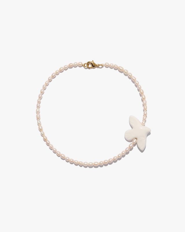 MYRNI necklace with oval pearls and bird