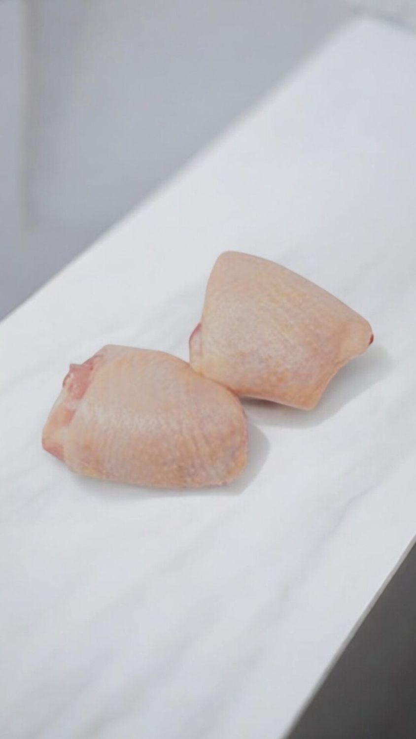 CHICKEN THIGH BONE IN SKIN ON
