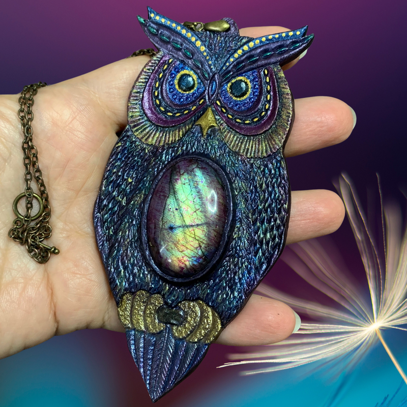 Hand tooled leather iridescent fantasy owl pendant with rainbow labradorite