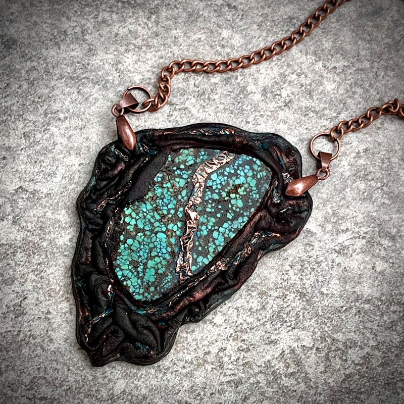 Exclusive pendant with Hubei turquoise slab wrapped in leather with natural copper accents