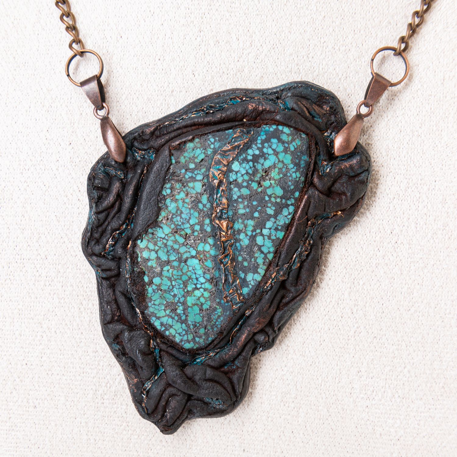 Exclusive pendant with Hubei turquoise slab wrapped in leather with natural copper accents