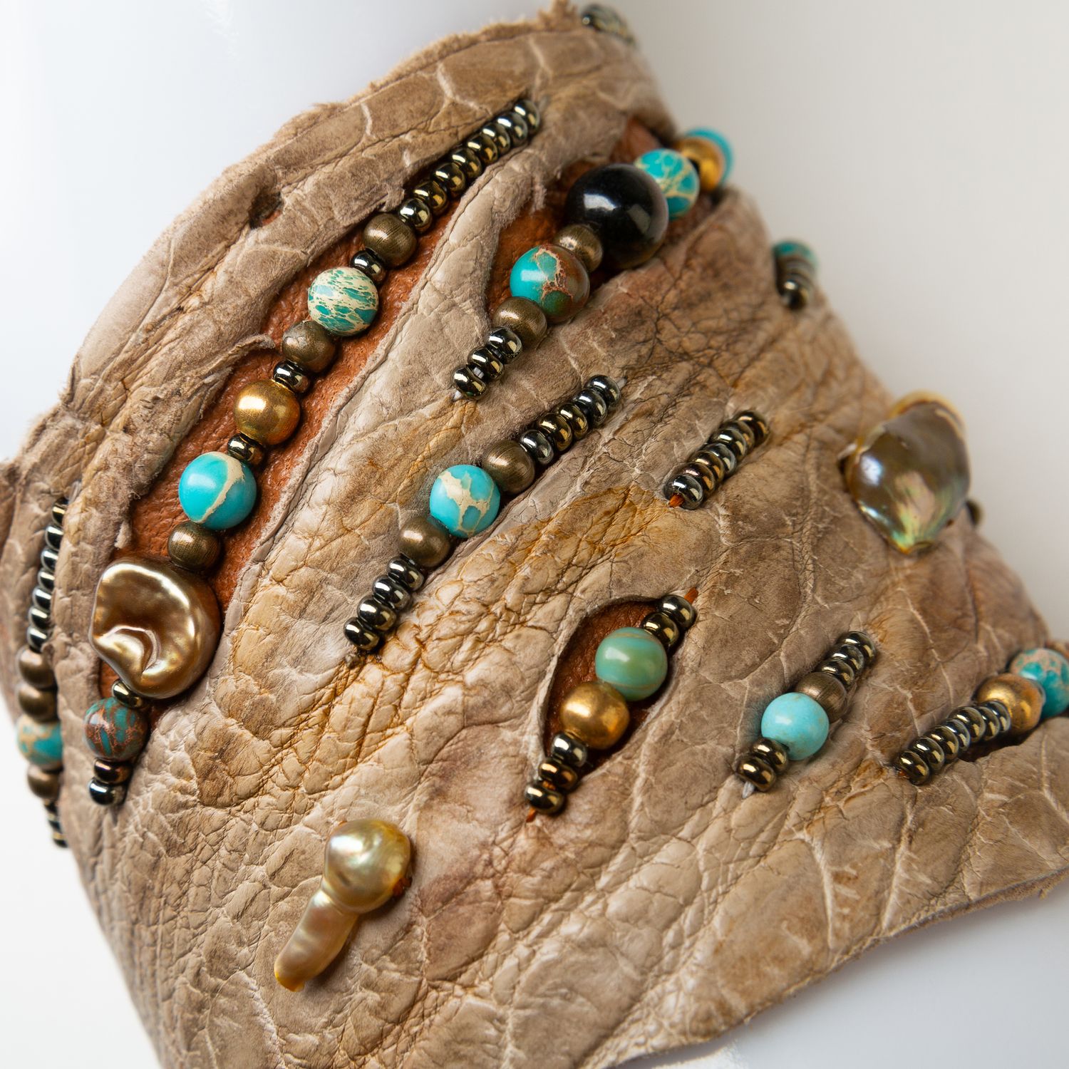 Crocodile leather tribal bracelet adorned with pearls, turquoise, jasper, tiger eye and beads