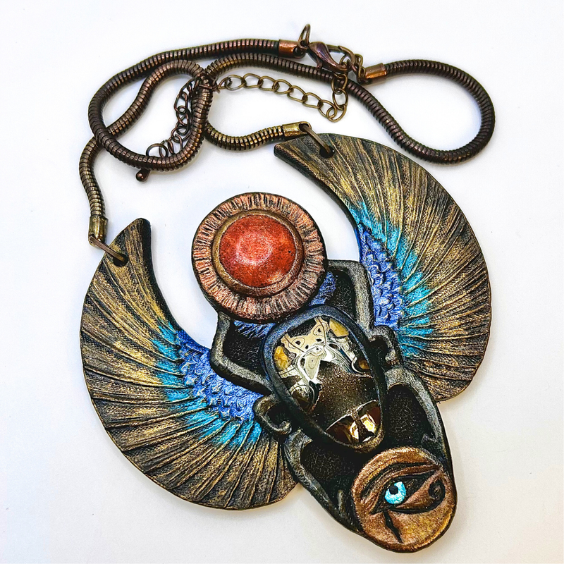 Tooled leather Egyptian scarab necklace by GemsPlusLeather - Hand tooled and hand painted jewelry with pyritized simbircite-ammonite and coral
