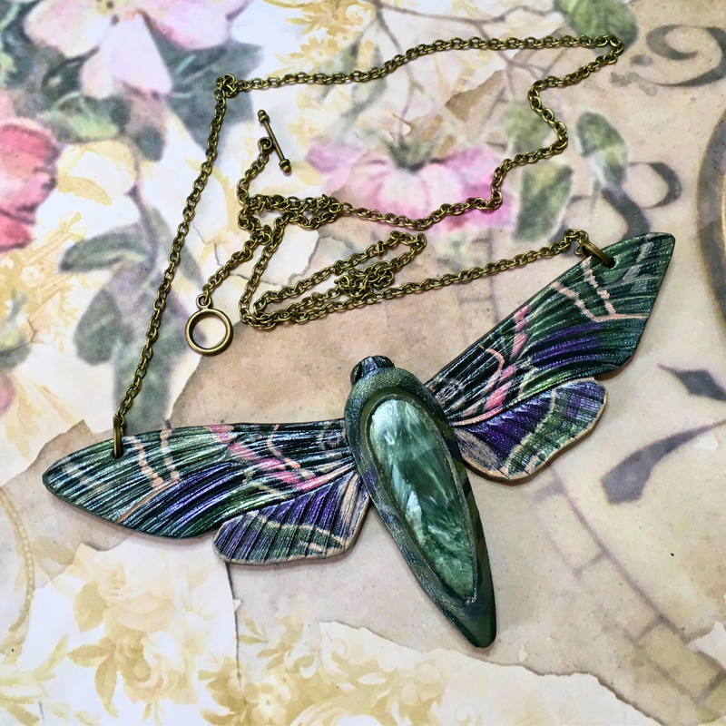 Hand tooled and painted leather hawk moth necklace with seraphinite - Fantasy pendant - Handmade artisan jewelry - Original gift for her