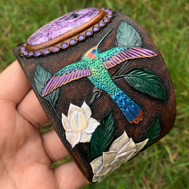 Tooled leather hummingbird bracelet - Hand painted leather cuff bracelet with charoite cabochon and hummingbirds with iridescent sheen