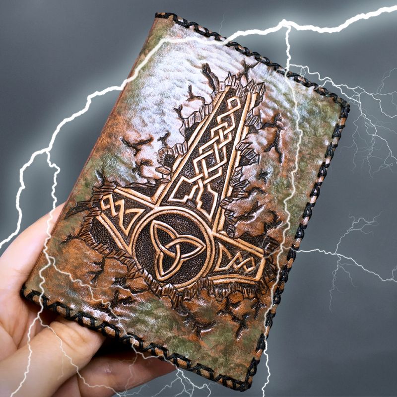 Hand tooled leather passport cover with Celtic design