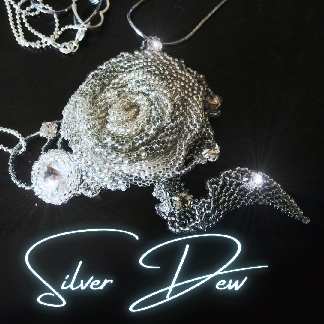 Beaded silver rose pendant with crystal clear rhinestones and sterling silver chains
