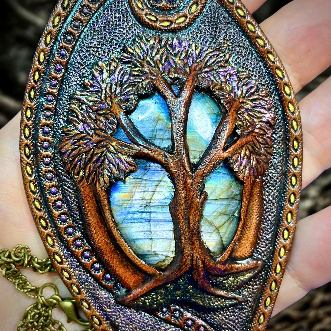 Tooled leather tree of life pendant with rainbow labradorite