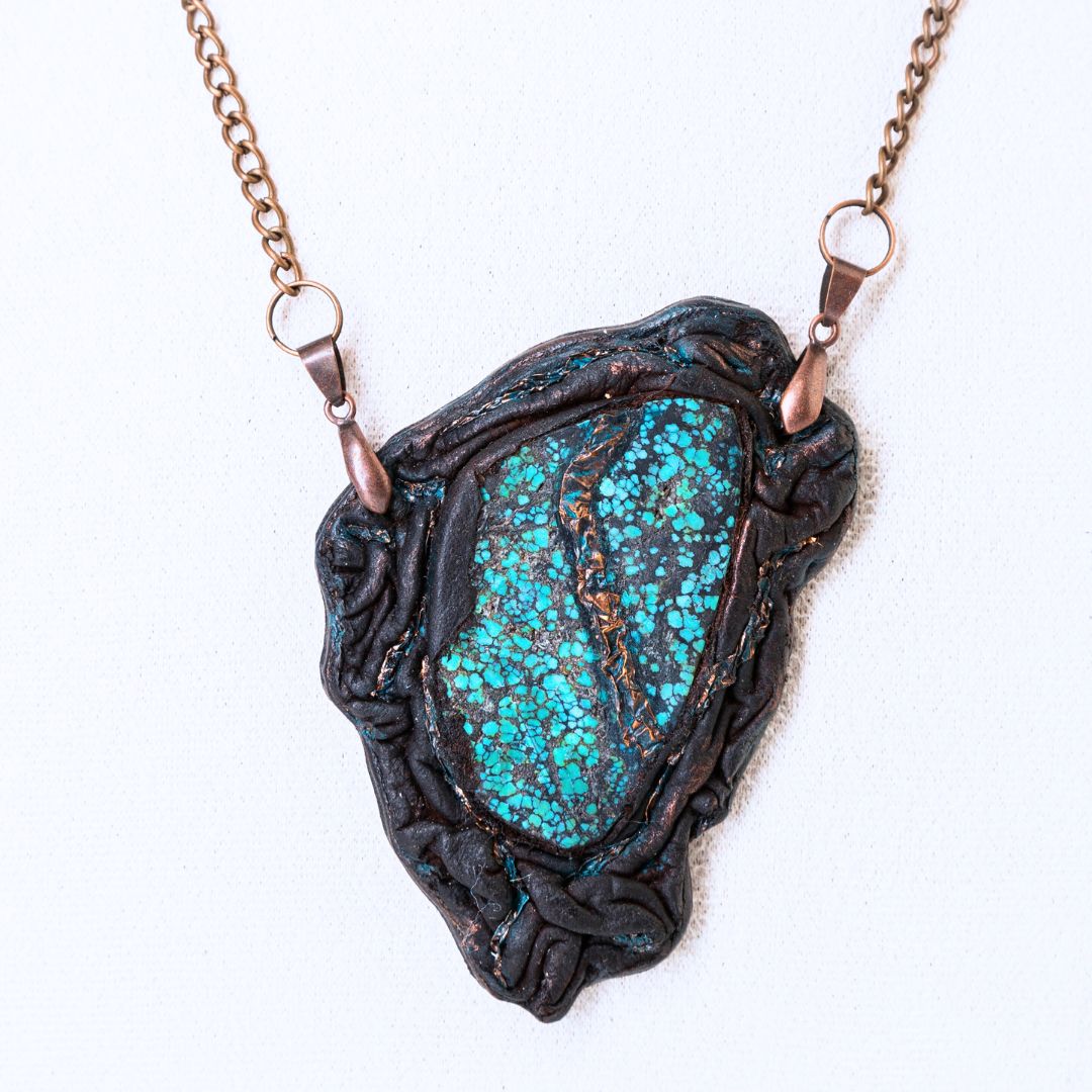 Exclusive pendant with Hubei turquoise slab wrapped in leather with natural copper accents