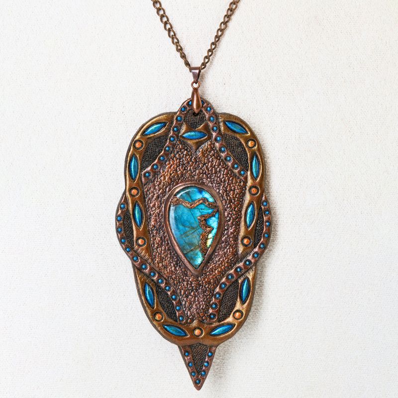Hand tooled leather pendant with blue labradorite and copper chain
